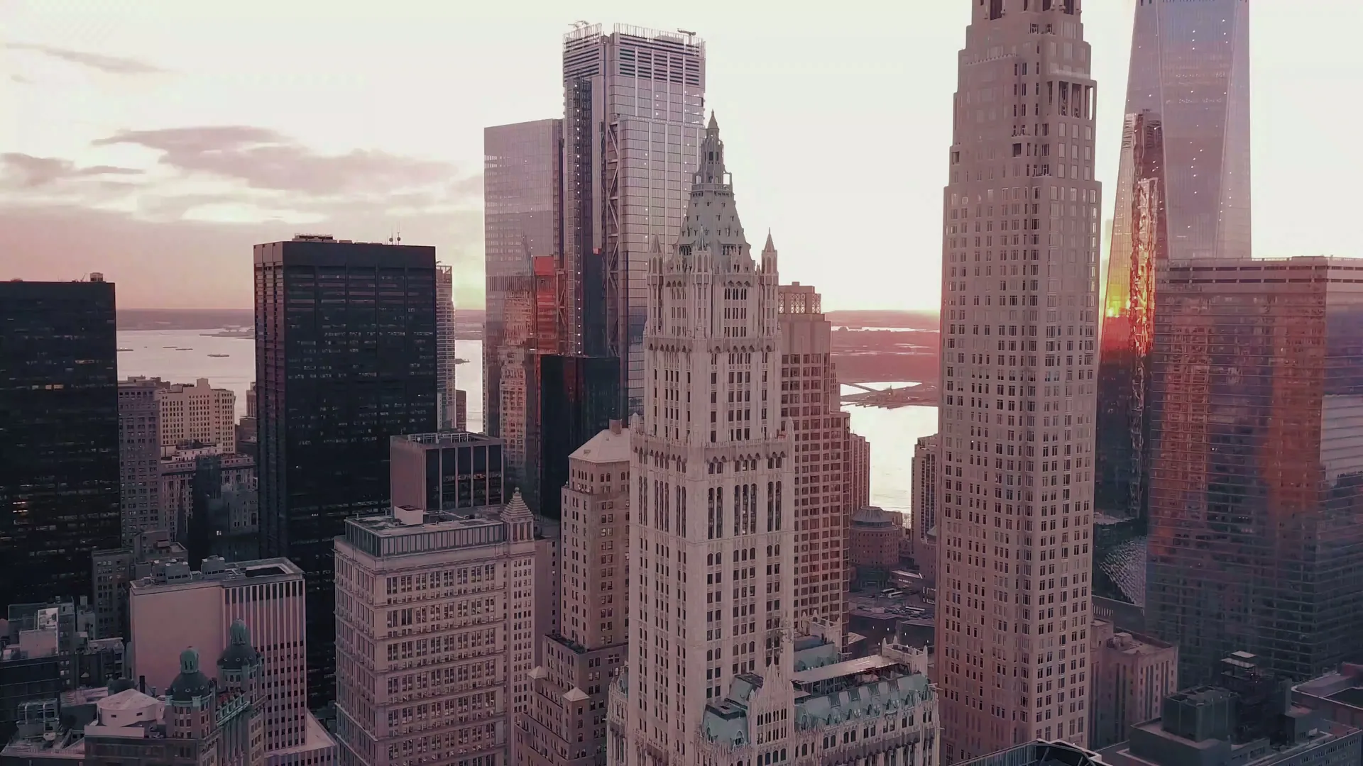 Golden-hour aerial of Lower Manhattan — Roesch Real Estate Group